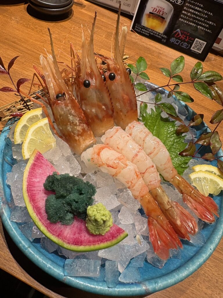 Button shrimp sashimi
